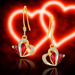 Kolczyki srebrne pozłacane serca 925 dla kobiety