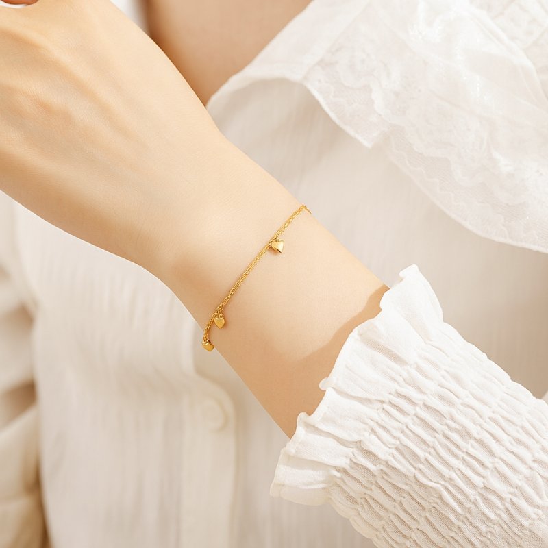 Bransoletka damska celebrytka serca srebro pozłacane próba 925