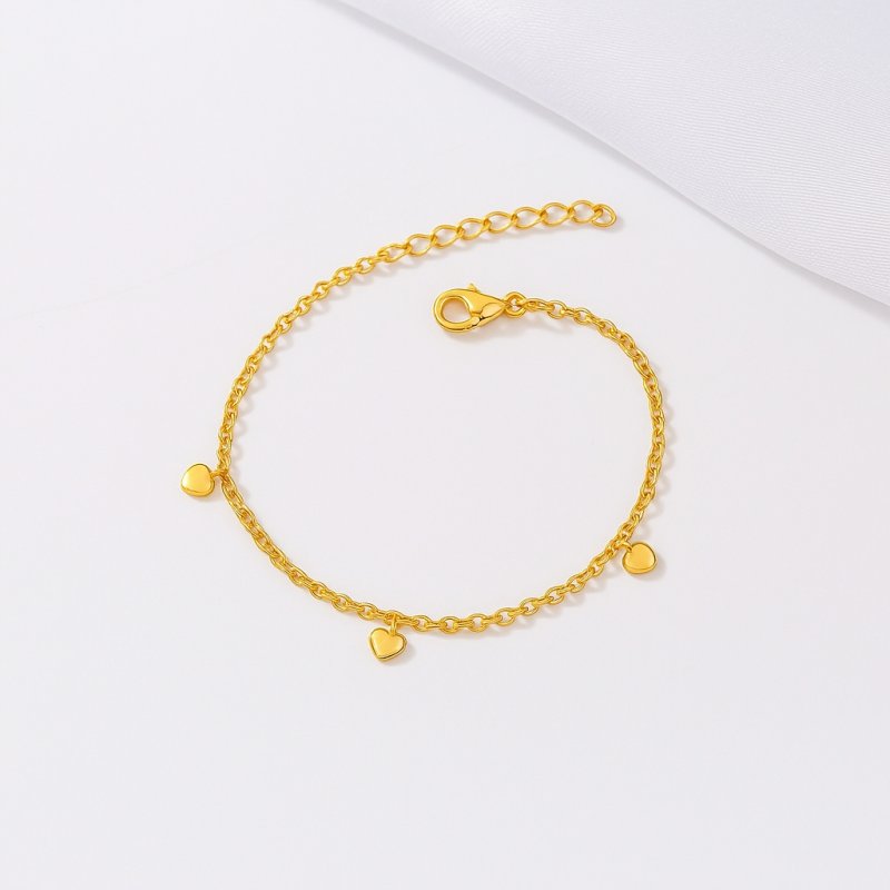 Bransoletka damska celebrytka serca srebro pozłacane próba 925