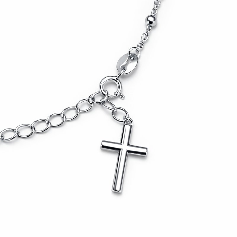 Srebrna bransoletka na rękę rodowana z krzyżykiem i medalikiem srebro 925